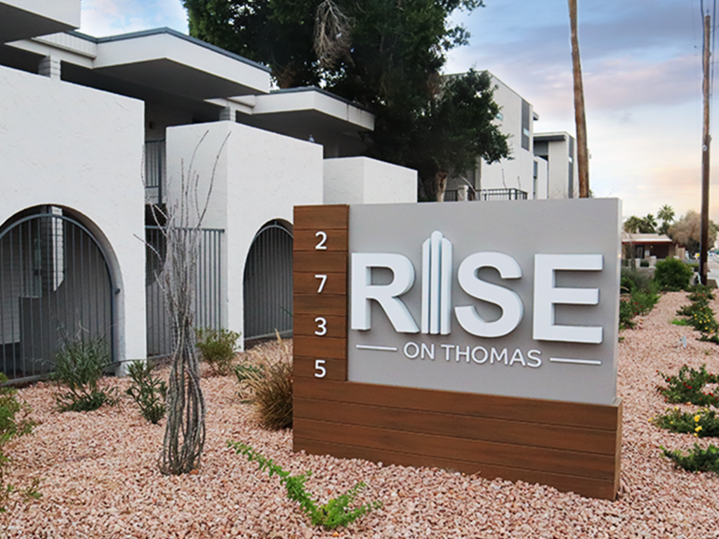 Rise on Thomas apartment monument sign. Sold by Rise48 Equity