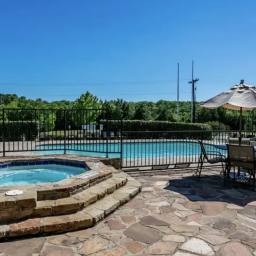 A pool behind a gate at Rise Hillcrest